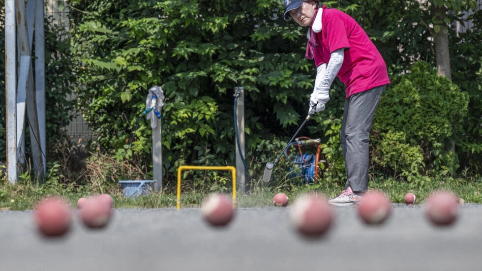 日本の年配の「ゲートボール」選手は暑さに無敗