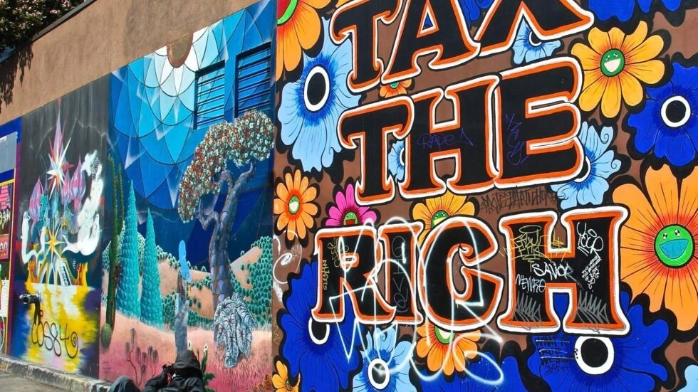 世界で最も裕福な1%は10年間で40兆ドル以上を稼いだ、とオックスファムは言う